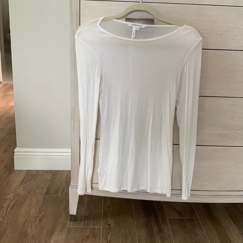 This BCBG Generation top is made in USA The material is 96% rayon and 4% spandex